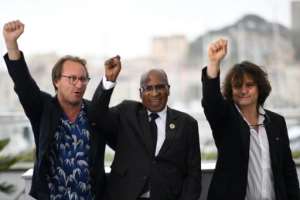(From L) French director Nicolas Champeaux, South African anti-apartheid campaigner and former political prisoner Andrew Mlangeni and French co-director and screenwriter Gilles Porte present at Cannes