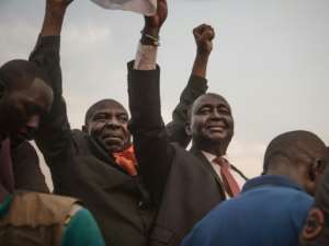 Francois Bozize, right, is under an international arrest warrant for his role in the conflict. By FLORENT VERGNES (AFP/File)