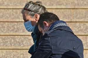 Françoise Grandclaude arrives at the Algiers courthouse for the trial of the kidnapping and beheading in 2014 of her partner, the French mountaineer Hervé Gourdel, claimed by a jihadist affiliate of the Islamic State group.  By RYAD KRAMDI (AFP)