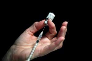 France is opening up booster shots as even with a high vaccination rate, Covid cases are surging. By Fred TANNEAU (AFP/File)