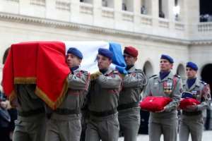 France's highest award, the l'legion d'Honneur was placed on each of the coffins. By Thibault Camus (POOL/AFP)