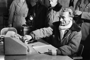 French General Jean Thiry presses the button which triggers the third French nuclear test explosion in the Algerian Sahara in 1960. By - (AFP/File)
