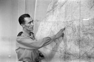 French General Jean Thiry speaks to journalists in 1960 about the third French nuclear test in the Algerian Sahara, the operation called