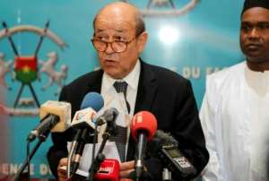 French Foreign Minister Jean-Yves Le Drian visited Ouagadougou last month and announced a 30 million euro ($34 million) aid package for Burkina Faso, Mali and Niger to help spur development. By Handout (BURKINA FASO PRESIDENT OFFICE/AFP/File)