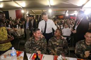 French President Emmanuel Macron addressed French troops at a Christmas dinner. By Ludovic MARIN (AFP)