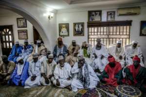 Fulani men at the gathering at the Sarkin Fulani's palace in Lagos' Surulere district. The Fulani have a proud tradition as cattle herders but most of the men are urban. By Luis TATO (AFP)