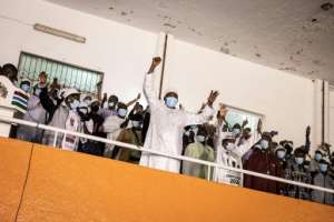 Gambia President Adama Barrow celebrates after his re-election was announced on Sunday. By JOHN WESSELS (AFP/File)