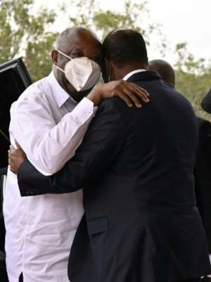 Gbagbo (L) met President Alassane Ouattara for long-awaited talks in July. By Issouf SANOGO (AFP/File)