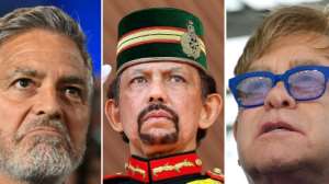 George Clooney and Elton John are among those who have criticsed the new laws being introduced by the Sultan of Brunei Hassanal Bolkiah (C). By Valerie MACON, Karen BLEIER (AFP/File)