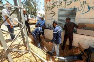 Gecol also has to repair damage caused by looters who have plundered electricity cables for copper to be sold on the black market. By Mahmud TURKIA (AFP)