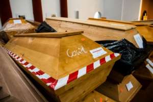 Germany's official Covid death toll now tops 100,000. By JENS SCHLUETER (AFP/File)