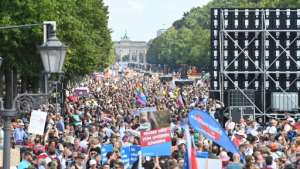 German demonstrators against mask rules and other restrictions tried to storm parliament in the biggest of several European protests over the weekend. By John MACDOUGALL (AFP)