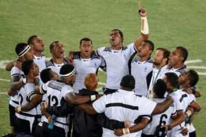 Golden days: Fiji players pray after winning the gold in Rio in 2016. By PHILIPPE LOPEZ (AFP/File)