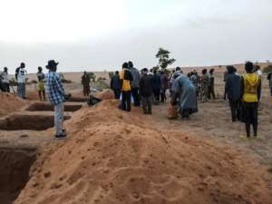 Graves have been dug for the victims of Sobane Da. Ninety-five people were killed, according to a provisional report. By STRINGER (AFP)