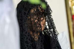 Grace Mugabe, the former leader's wife, arrived with his body from Singapore. By ZINYANGE AUNTONY (AFP)