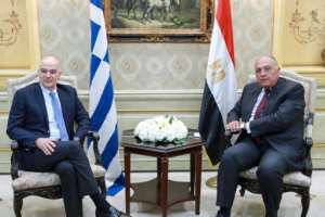 Greek Foreign Minister Nikos Dendias (L) met with his Egyptian counterpart Sameh Shoukry in Cairo on Sunday. By - (Egytian Foreign Ministry/AFP)