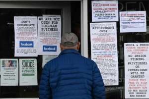 Gun stores in the US have seen an uptick in business as a result of the spreading coronavirus pandemic. By Robyn Beck (AFP)