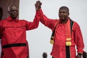 Happier times: Dos Santos and Lourenco, his hand-picked successor, at a rally in Luanda in August 2017. By MARCO LONGARI (AFP)