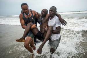 Hauled to safety: A volunteer victim is plucked from the sea