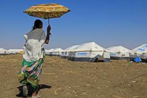 Haven: A woman who fled the Tigray conflict, pictured at the Tenedba refugee camp in Mafaza, eastern Sudan. By ASHRAF SHAZLY (AFP)