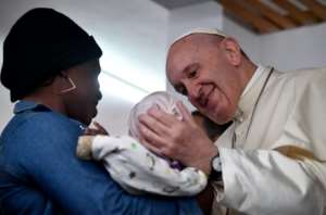 He also visited a hospital which hosts a programme for HIV-positive people and AIDS patients. By Tiziana FABI (AFP)