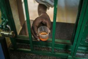 Help: A heroin addict gets medication at a clinic run by Doctors Without Borders (MSF) in Karuri. By Yasuyoshi CHIBA (AFP)
