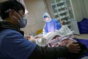 Hong Kong and China have imposed some of the world's strictest measures to prevent infections in maternity units: birthing partners are banned from labour units, delivery rooms and post-natal wards in public hospitals. By STR (AFP)