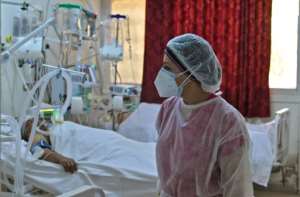 Hospitals in Tunisia's hard-hit central region of Kairouan are battling with shortages of oxygen, intensive care beds and nurses to deal with the surge in Covid patients. By FETHI BELAID (AFP)