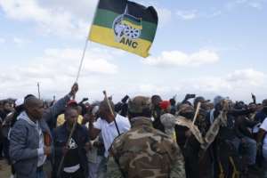 Hundreds of Zuma loyalists are camped outside their leader's home. By Emmanuel Croset (AFP)