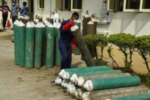 Hundreds of oxygen tanks are needed each day to treat patients. By PIUS UTOMI EKPEI (AFP)
