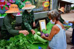 In Thailand, soldiers have been helping residents during the lockdown restrictions. By Handout (ROYAL THAI ARMY/AFP)