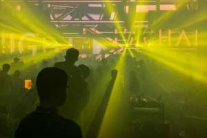 In the Super Monkey nightclub in the Chinese city of Wuhan, where the virus first emerged in 2019, virus worries were worlds away for crowds of late-night revellers. By Hector RETAMAL (AFP)
