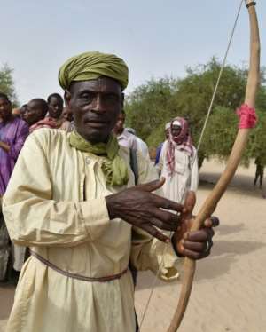 In Toumour, a village in northeastern Niger, local people are so fed up with the violence that some want to fight back.  By ISSOUF SANOGO (AFP/File)