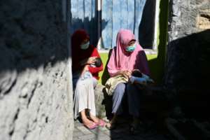 In Indonesia, some pregnant women there have had to attend appointments with physicians in full-suited hazard gear because of the pandemic -- an instantly distressing situation. By ADEK BERRY (AFP)