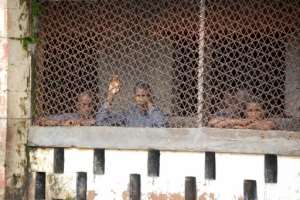 Inmates at Mafanta prison in Magburaka. Over-crowding, poor hygiene and jungle-like violence are chronic problems in Sierra Leone's prison system, say detainees. By Saidu BAH (AFP)