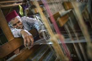 It takes a day to weave a meter of brocade in the Ouazzani workshop in Fez. By FADEL SENNA (AFP)