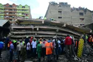 It is not clear how many people were in the building at the time, or how many may still be trapped, but there were 57 units in the structure. By Simon MAINA (AFP)