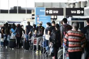 Italian authorities fear holidaymakers may be bringing the virus back with them. By Filippo MONTEFORTE (AFP/File)