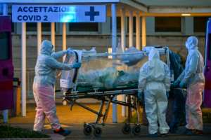 Italy, the hardest hit nation in Europe, announced another surge in deaths. By ANDREAS SOLARO (AFP)