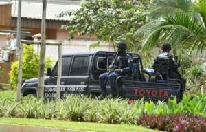 Ivorian gendarmes have blocked access to the residence of opposition chief Henri Konan Bedie. By Issouf SANOGO (AFP)