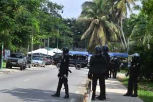 Ivorian police blocked the street around opposition leader Henri Konan Bedie's house in Abidjan. By Issouf SANOGO (AFP)