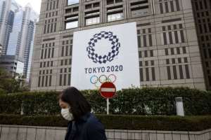 Japan's government was forced to dismiss another report casting doubt on the Tokyo Olympics going ahead this year. By Behrouz MEHRI (AFP)
