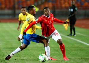 Junior Ajayi (R) completed the scoring for Al Ahly in a convincing Egyptian Premier League victory over ENPPI.. By Khaled DESOUKI (AFP)