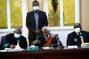 Judge Issam al-Din Mohammad Ibrahim (C) presides over the trial. By ASHRAF SHAZLY (AFP)
