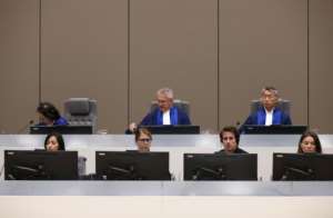 Justice: International Criminal Court on Monday verdict. Chief Justice Robert Fremr is in the middle of the back row. By EVA PLEVIER (POOL / AFP)