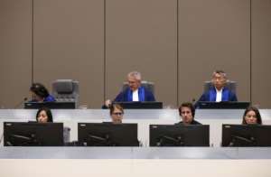 Justice: The International Criminal Court at Monday's verdict. Head judge Robert Fremr is in the centre of the back row. By EVA PLEVIER (POOL/AFP)