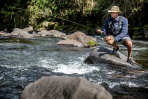 Kenya Fly Fishers' Club trustee Musa Ibrahim says there are now many local Kenyans who fish. By LUIS TATO (AFP)