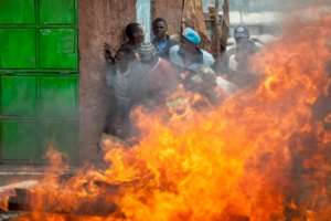 Kenyan opposition supporters demonstrate in 2017 after Kenyatta won a presidential election re-run which the opposition boycotted. By Georgina Goodwin (AFP)