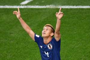 Keisuke Honda came off the bench to keep Japan's hopes of reaching the knockout stage in their own hands. By Anne-Christine POUJOULAT (AFP)