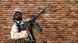 Killed: Boko Haram leader Abubakar Shekau, seen in a video released by his group in January 2018. By Handout (BOKO HARAM/AFP)